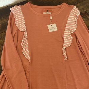 Women’s long sleeved blouse.